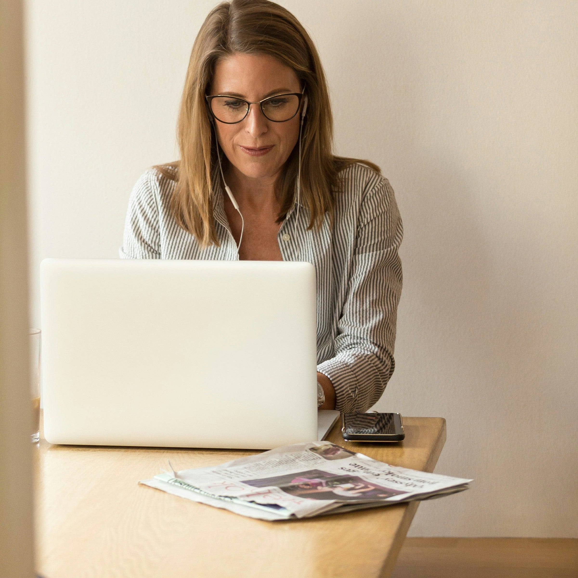 Woman working at a laptop